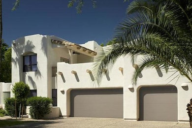 Photo of an attached garage in Phoenix with three or more cars.