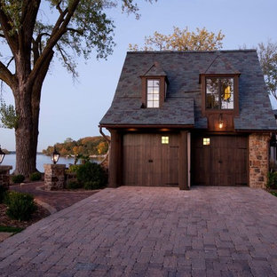Mid-sized elegant attached two-car garage photo in Minneapolis