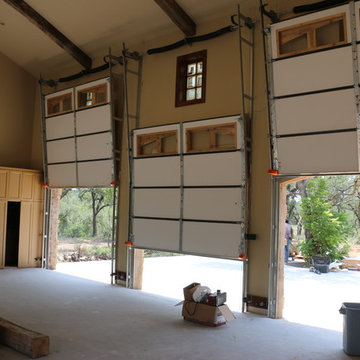 Vertical-lift real-wood overhead garage doors