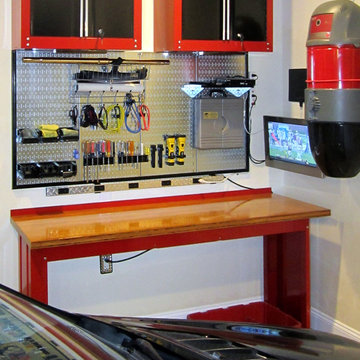Wall Control Metallic Pegboard Over a Workbench with Custom Framing
