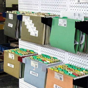 Wall Control tool board shelf brackets make great storage for hanging folders |
