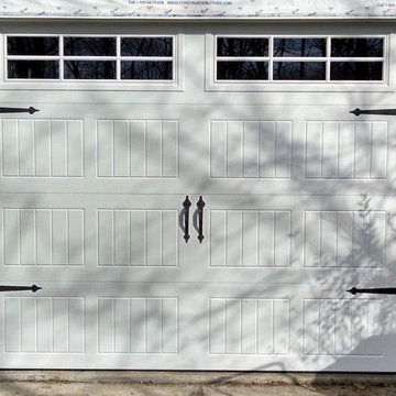 White Overhead Garage Door With Rectangular Windows
