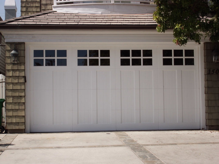 Mid-sized two-car attached garage with a coastal theme