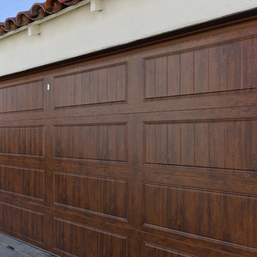 Wood gates and matching garage door