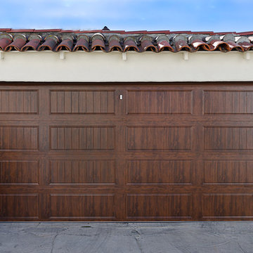 Wood gates and matching garage door
