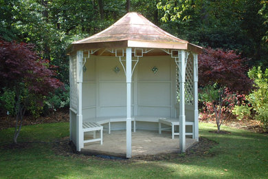 This is an example of a large traditional detached garden shed and building in Other.