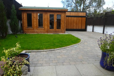 Photo of a contemporary garden shed and building in Glasgow.