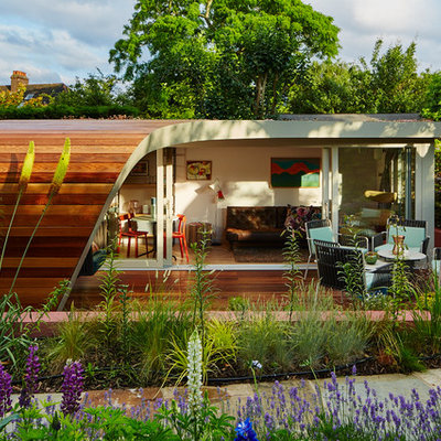 Eclectic detached garden shed photo in London