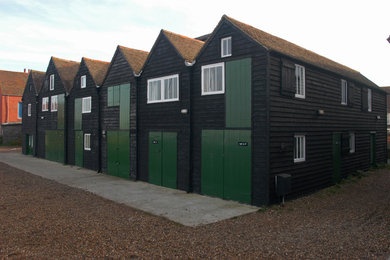 This is an example of a beach style garden shed and building in Kent.