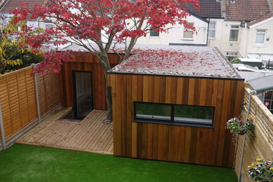 Inspiration for a medium sized contemporary garden shed and building in Other.