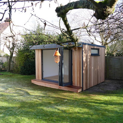 Studio / workshop shed - mid-sized contemporary detached studio / workshop shed idea in Other
