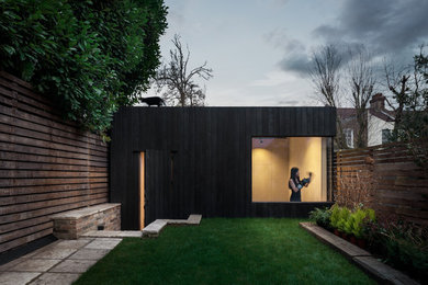 Photo of a small modern detached office/studio/workshop in London.