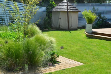 Photo of a medium sized contemporary garden in Cambridgeshire.
