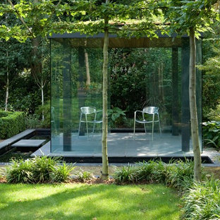 Photo of a small contemporary detached garden shed and building in London.