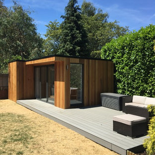 This is an example of a medium sized contemporary detached office/studio/workshop in Surrey.