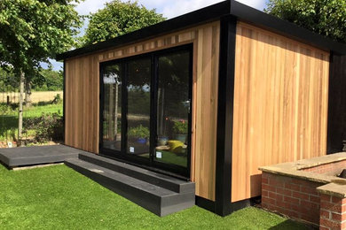 This is an example of a contemporary garden shed and building in Cheshire.