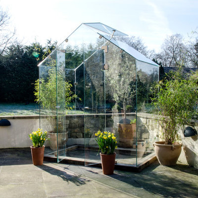 Greenhouse - small contemporary detached greenhouse idea in Other