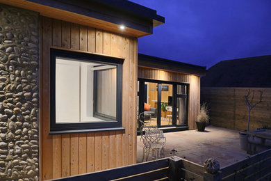 Photo of a contemporary garden shed and building in Sussex.
