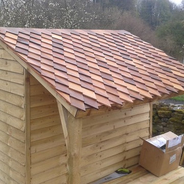 Shingled shed and decking area.