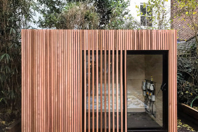 This is an example of a contemporary garden shed and building in London.