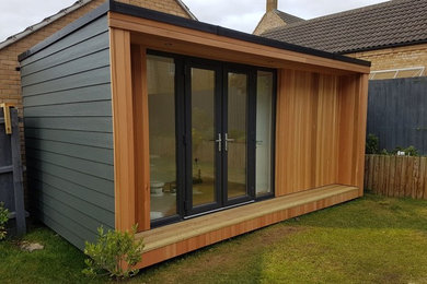 This is an example of a contemporary garden shed and building in Cambridgeshire.