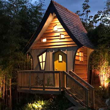 The Crooked House Treehouse at night
