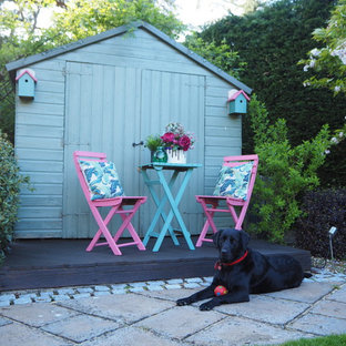 This is an example of a medium sized farmhouse detached garden shed and building in Surrey.