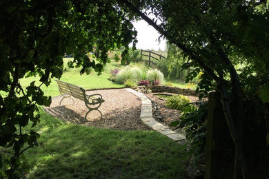 Design ideas for a large farmhouse back garden in Oxfordshire.