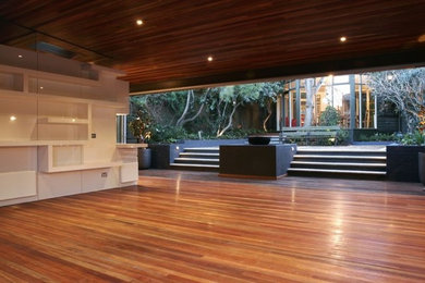 Kleine, Halbschattige Moderne Gartenmauer hinter dem Haus mit Betonboden in Melbourne