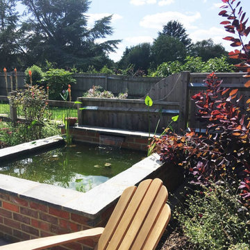 Amersham Barn Garden - Raised Pond with aquatic planting