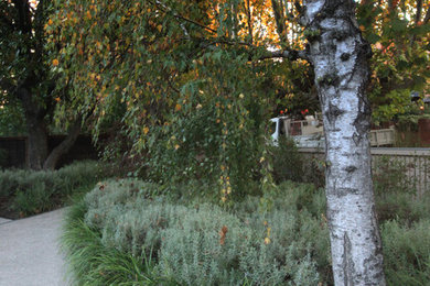 Mittelgroßer Landhausstil Vorgarten mit Auffahrt und Natursteinplatten in Melbourne