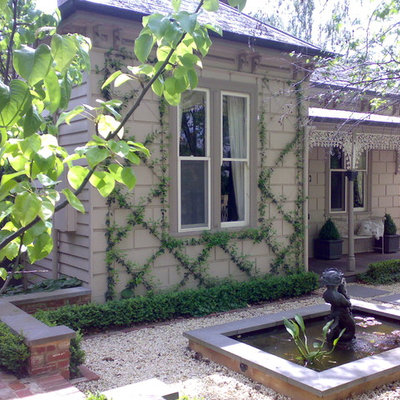 Photo of a traditional courtyard water fountain landscape in Melbourne.