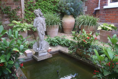 This is an example of a farmhouse raised pond in Sussex.