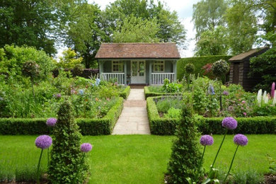 This is an example of a large traditional back garden in Hertfordshire.