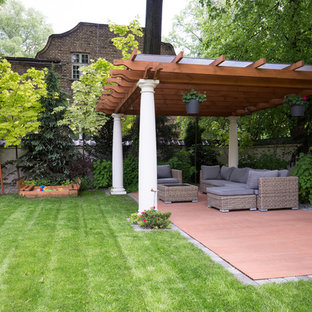 This is an example of a large traditional back garden in Hampshire.