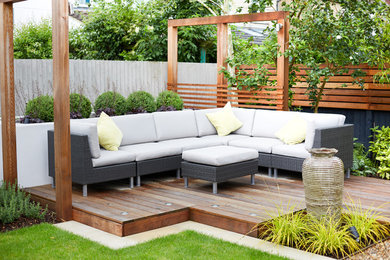 Design ideas for a medium sized contemporary back garden in Cheshire.