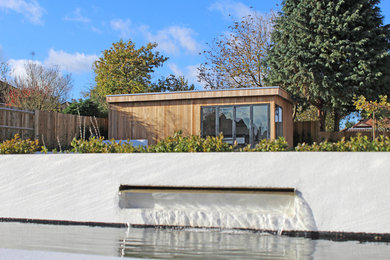 This is an example of a contemporary garden in Cambridgeshire.