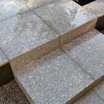 Contemporary Pond Garden - Granite steps.