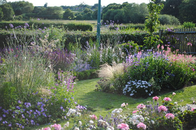 Inspiration for a large rural back full sun garden for summer in Devon.