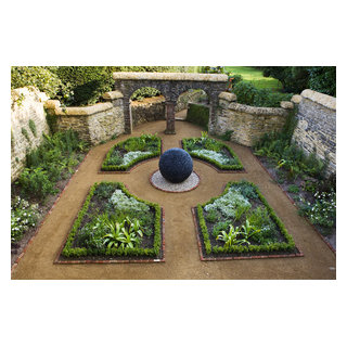 Dark Planet garden sculpture in traditional courtyard