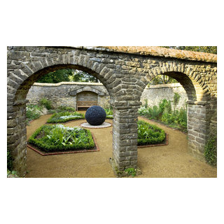 Dark Planet garden sculpture in traditional courtyard