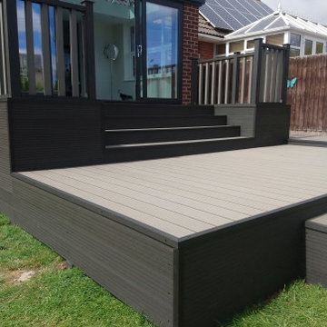 Deluxe Orangery with two-tone composite decking balcony