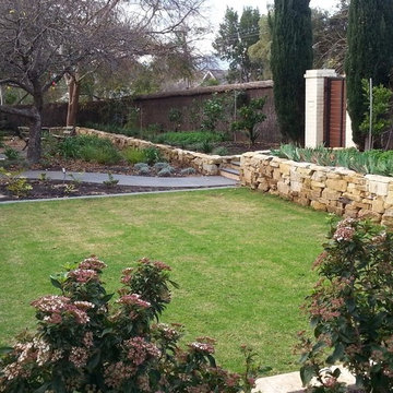Dry-stone garden retaining wall