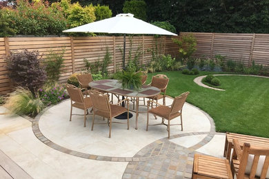 Photo of a small contemporary back patio in Surrey.
