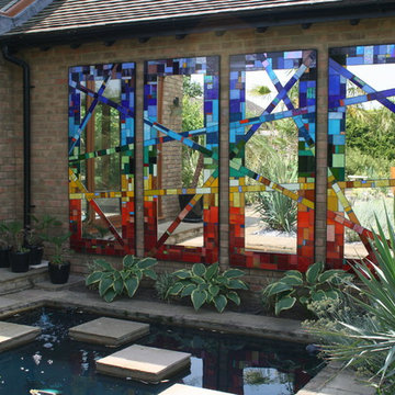 Exterior wall mosaic -backdrop to pond