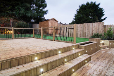 Design ideas for a large contemporary back formal full sun garden for summer in Other with decking.
