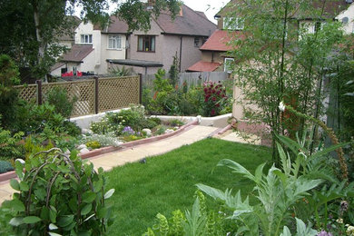 ロンドンにあるトロピカルスタイルのおしゃれな庭の写真