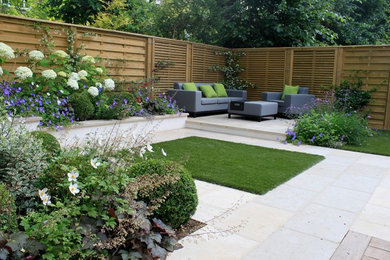 Medium sized contemporary back garden in Kent.