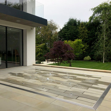 Large contemporary garden in Hale, Cheshire