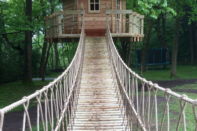 Log Rope Bridge leading to a 'floating' suspended treehouse